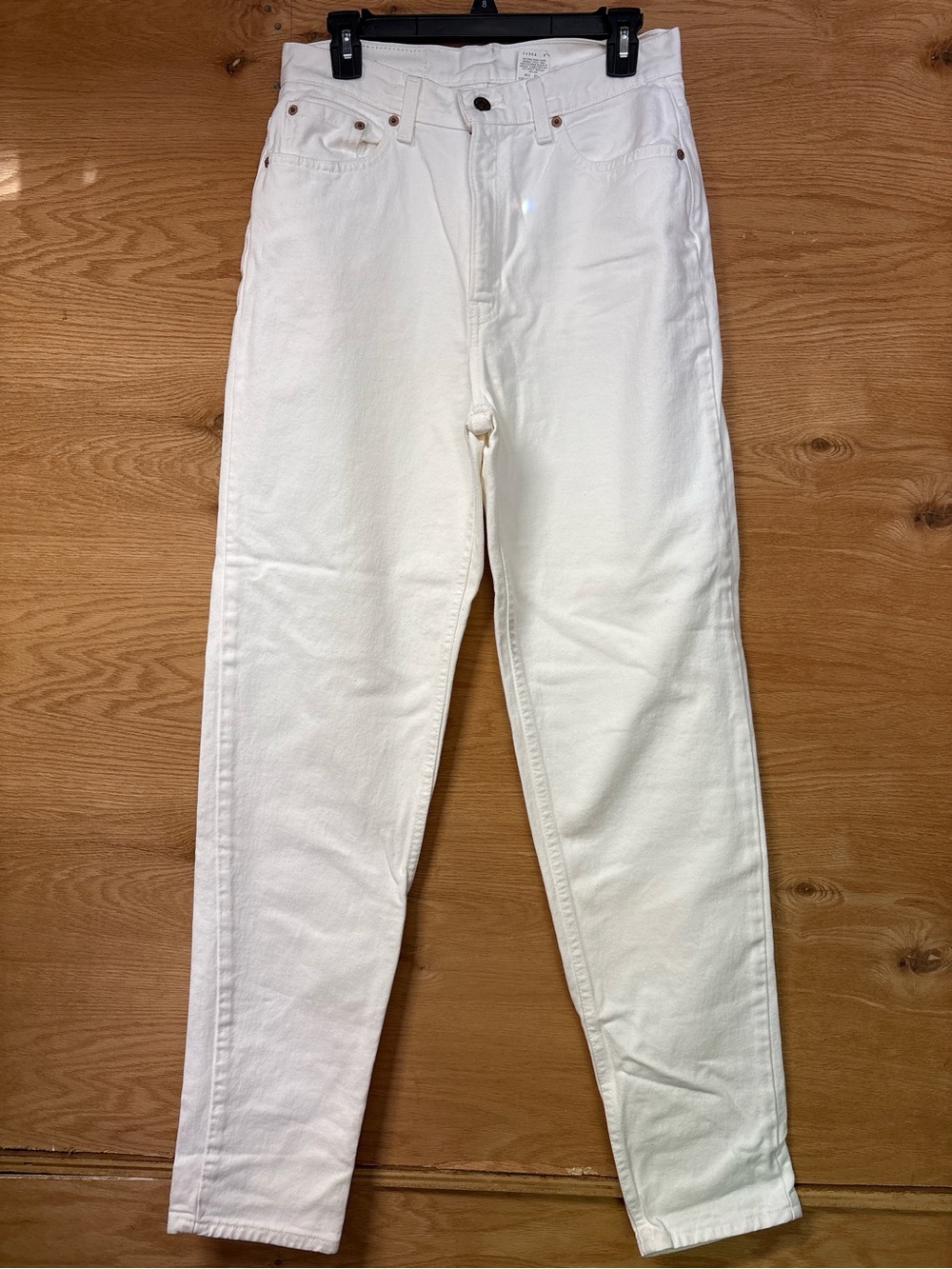 Levi’s 521 White High-Waist Tapered Leg Jeans